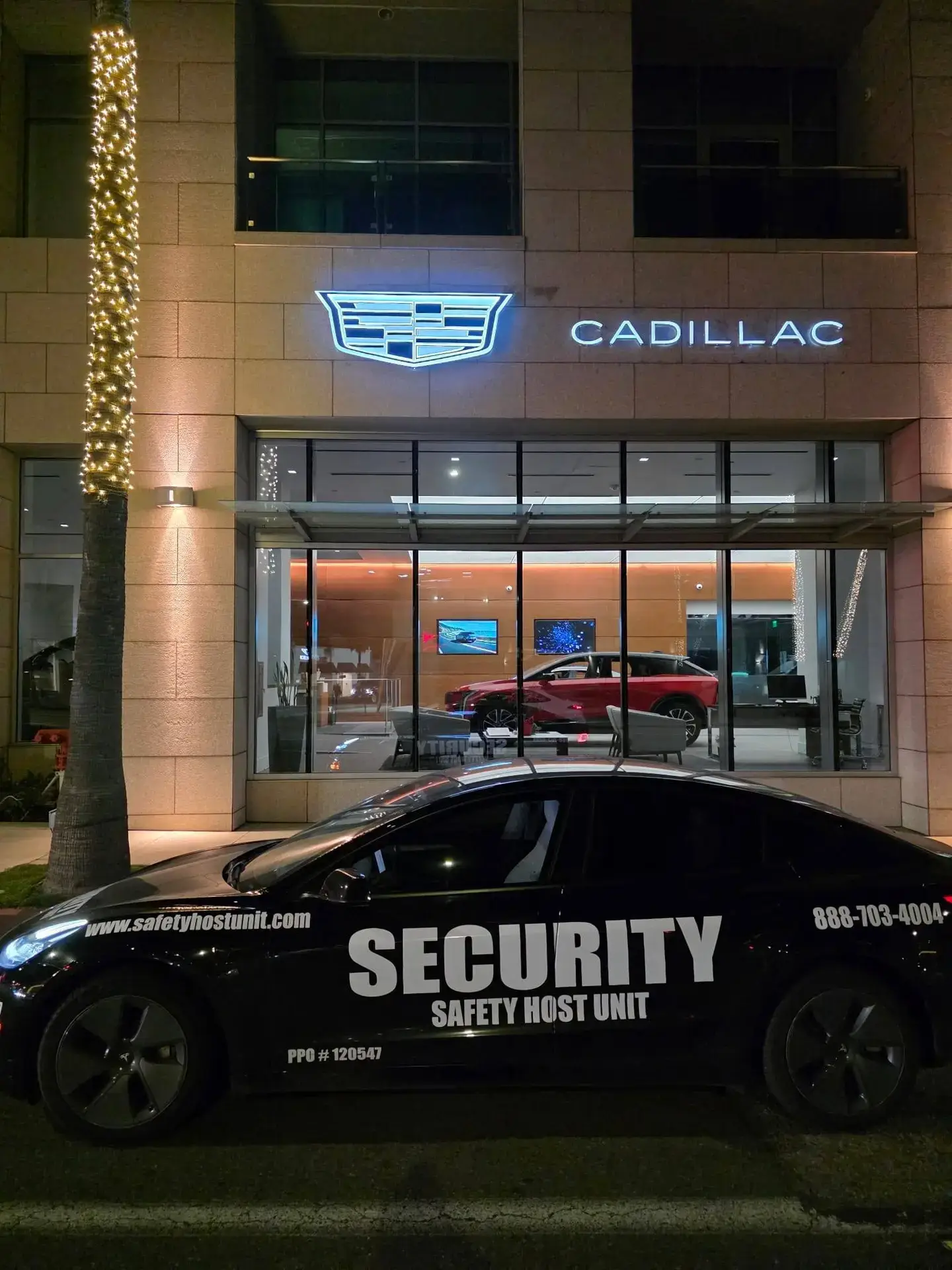 Patrol Car at Cadillac Showroom